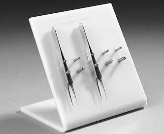 Tweezers holder These safe, convenient and portable holders for tweezers are made from strong white acrylic with stainless steel pins.