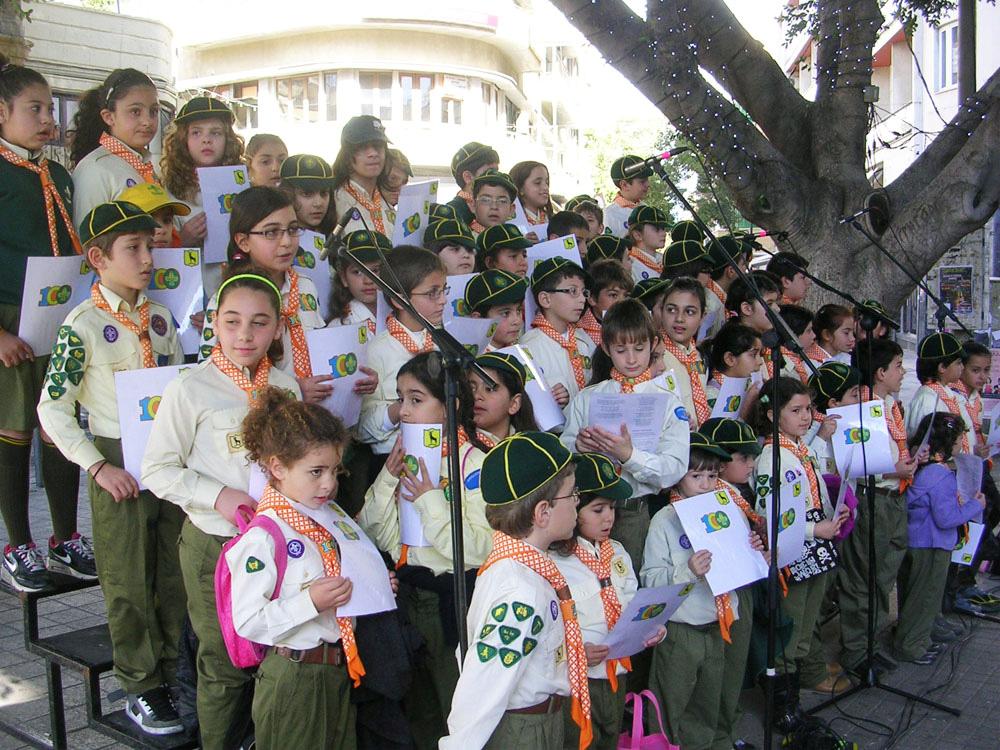 Scouts and Girls Scouts, Scout Leaders and Scout Veterans, all of them very proud and very enthusiastic about the great anniversary of The Movement in their country,