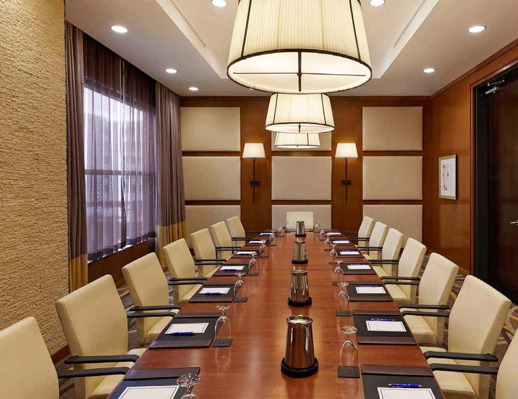 West End Boardroom abundant natural light shines onto the boardroom table where