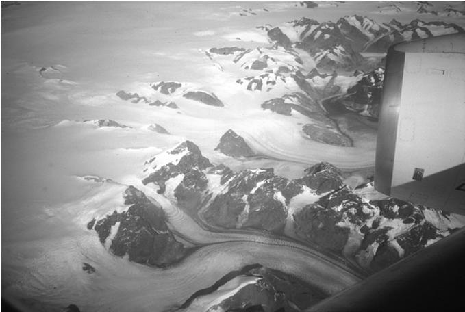 East Greenland Glacier Dynamics A typical valley glacier will add snow at its head and lose to melt at its foot.