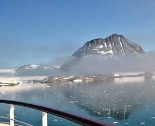Sailing in the fjords of Spitsbergen. Hiking opportunity. Natural delights: ice floes, jagged mountains, icebergs, icecaps, steep-sided valleys, steep cliffs, huge glaciers, glacier fronts.