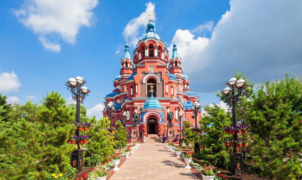 5D3N TRANS-SIBERIAN RAILWAY Cathedral of the Kazan Icon of the Mother of God in the city center of Irkutsk, Russia lakes and small settlements, followed by the Ural Mountains.