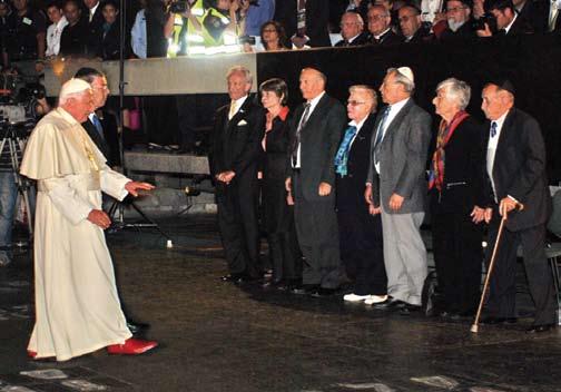 During his visit to Yad Vashem, Pope Benedict XVI greeted six Holocaust survivors and a Righteous Among the Nations Pope Benedict XVI greets (left to right) Holocaust survivors Ed Mosberg, Israela