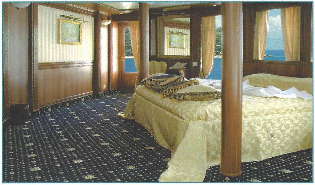 Each Suite and Stateroom features a wood- and marble-accented private bathroom, one queen bed or two twin beds, individual climate control, telephone, satellite television, minibar, safe, radio and