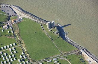 Fig. 1. Location map of the forts of the Saxon Shore. Fig. 2. Aerial photograph of the early fort at Reculver, showing attrition by coastal erosion.