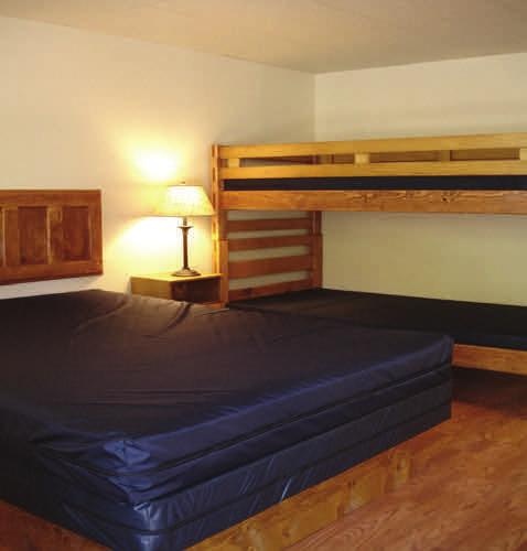 accessed from a central hallway 1 handicap room available 1 queen bed with a single bunk above it and a set of