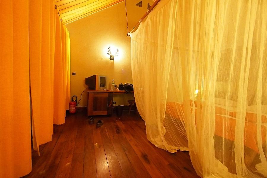 Inside they are clean and very comfortable with mosquito net draped beds, wall mounted fans and tiled floors.
