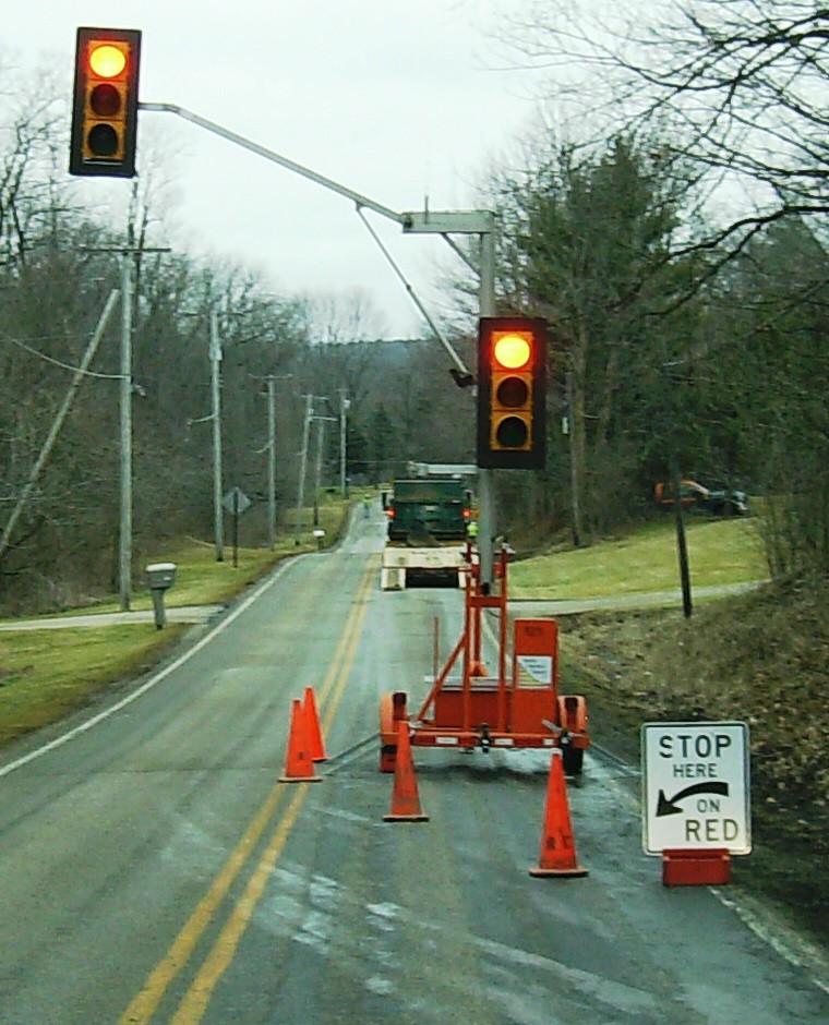 Whether we are using the portable traffic signal or other means of controlling traffic in a work zone, we ask motorists to please slow down when they pass by our work crews on the highway.