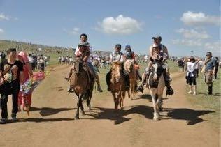 wrestling, archery and horse racing. The opening ceremony of our rural Naadam festival occurs at Khatgal town.
