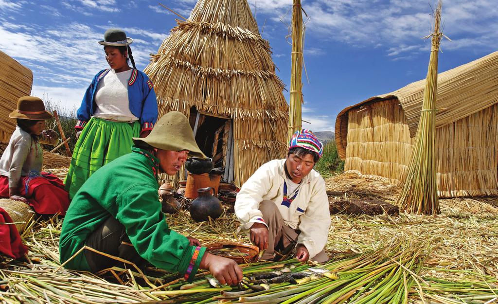 Uros Island residents weaving reeds in the traditional manner where after lunch we board a bus for Machu Picchu and our first guided visit of the stunning Lost City of the Incas.