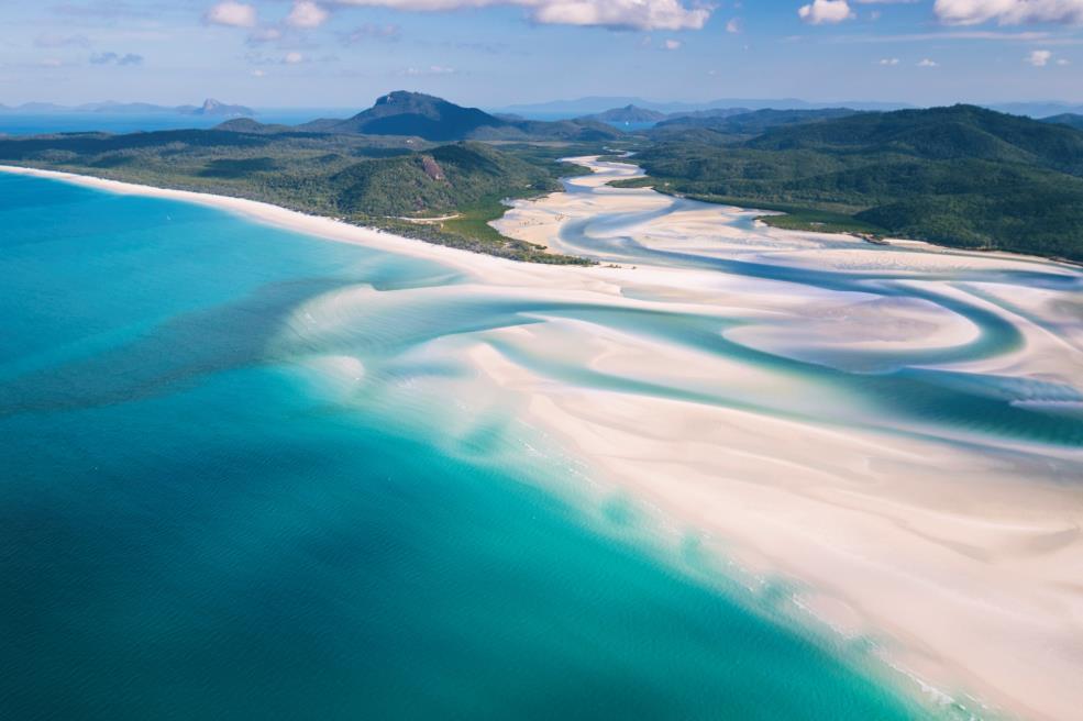 Cruise to Whitehaven Beach and Hill Inlet, and the perfectly shaped natural formation of Heart Reef.