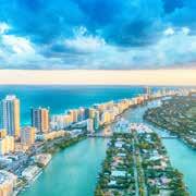 AIRPORT TRANSPORTATION MIAMI INTERNATIONAL AIRPORT: Distance to Hotel: 6 miles (15 minutes) Average Minimum Charges: Limousine... $125 Super Shuttle... $16 Rental Car... Varies Taxi... $28 Uber/Lyft.