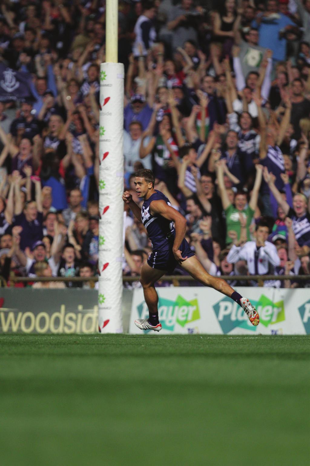 Fremantle s Stephen Hill celebrates after kicking the first goal during the