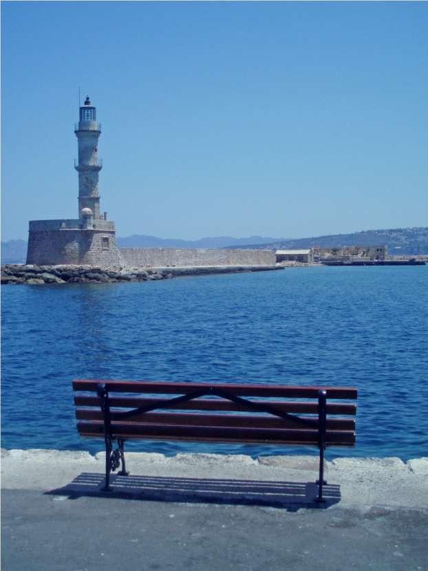 He arrived at another port*, where he stopped next to a bench, facing a big lighthouse, admiring