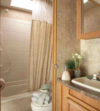 sink, medicine cabinet and radius shower curtain track