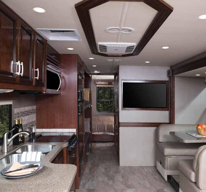 ADMIRAL TOP FEATURES High Gloss Cabinetry and Doors w/hidden Hinges Bedroom LED TV High Gloss Gel Vetrolite Ultra-Thick Fiberglass Skin (No Wood Substrate) Intense Halogen Projector Headlamps Side