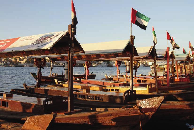 6 U N I T E D A R A B E M I R A T E S / Dubai U N I T E D A R A B E M I R A T E S DUBAI WOODEN ABRAS (WATER TAXIS) LOVES TAKING A TRADITIONAL ABRA ACROSS DUBAI CREEK TO THE GOLD SOUK + SPICE MARKET.