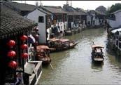 The picturesque Zhu Jia Jiao is a classic water village, over 400 years old with a signature five-arch bridge spanning the Cao Gang River.