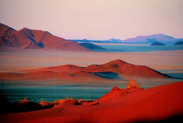 turn inland and fly over the Namib Desert to your lodge. Afternoon at leisure for scheduled activities.