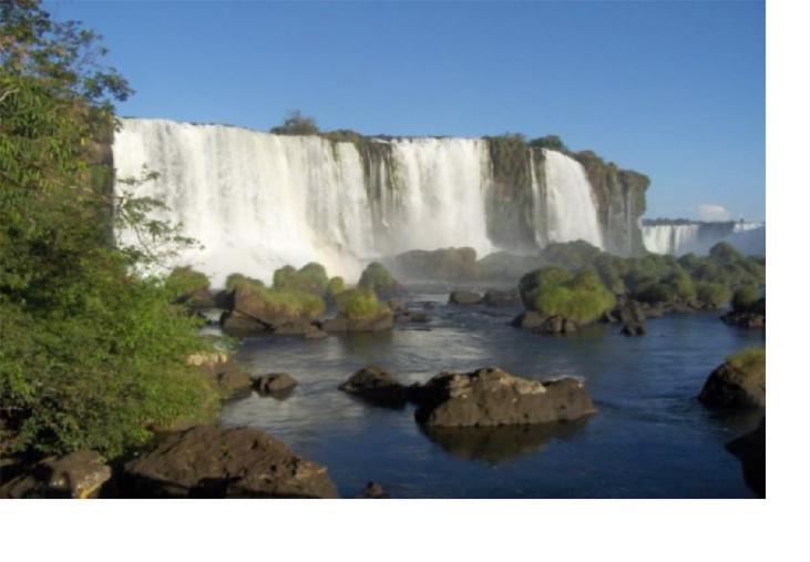 The walkway entering the river next to the Floriano Fall gives you a gorgeous panoramic view of the lower Iguazu river and the Devil s Gorge Canyon.