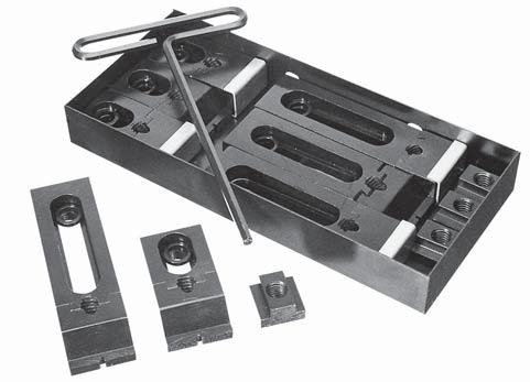 Nuzzler Edge Clamp Kits: Small Kit Contains: 4 Low Grip Clamps 4 Standard Grip Clamps 4 T-Slot Nuts 8 Washers 1 T-Handle Wrench 1 Holder For material information, see individual components T-Slot