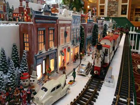 This year some lighted buildings and the above building on fire scene was added to the HO layout using Walthers and Woodland Scenics products.