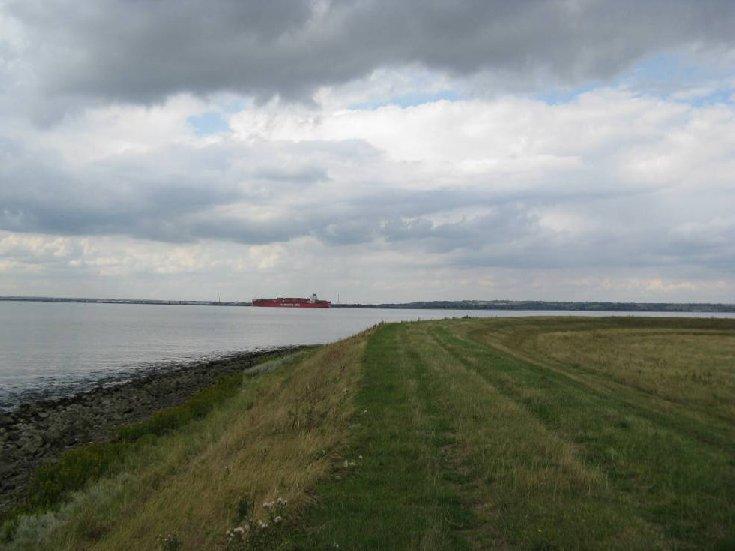 Thames Estuary Path Section 55 St Mary s Marshes North Kent Condition of the waterfront The flood defences comprise a wide grassed embankment from St Mary s Bay to Dagnam Saltings.