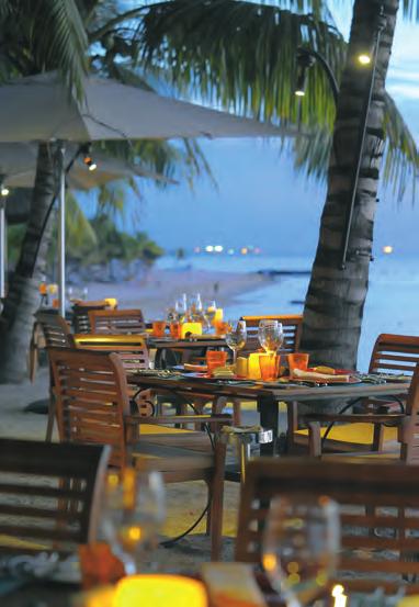 m. "Table d hôte" menu included in the half-board package or à la carte menu* LE CORAIL BLEU Bar Main bar, ideal to gaze at magnificent sunsets over the sea. Open from 8 a.