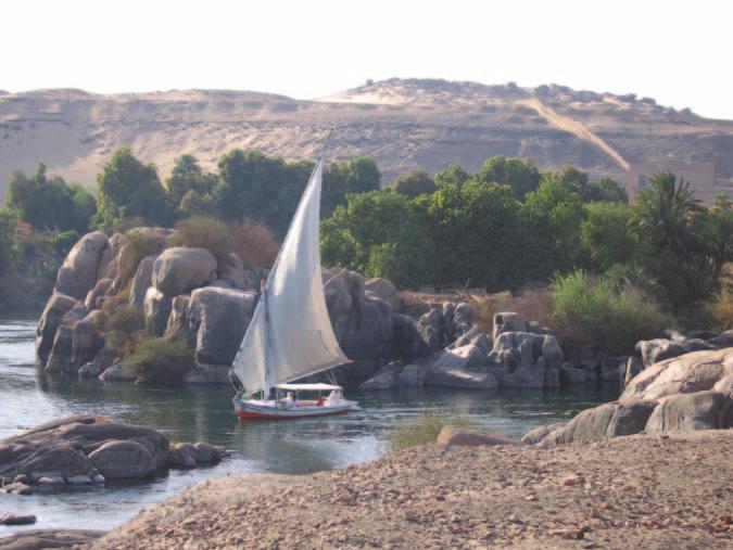 Figure 3. The tip of Elephantine Island at Aswan with a felucca steering around the island.