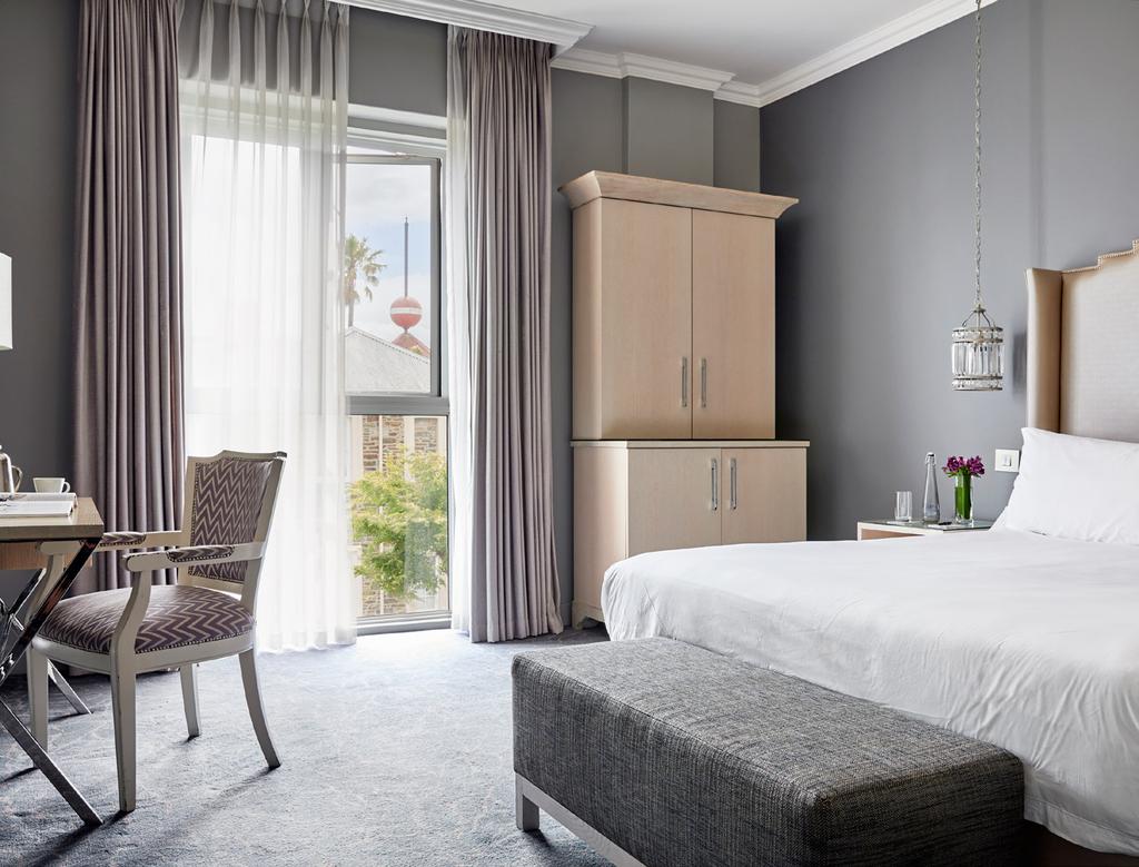 The hotel s regal ambience is felt throughout the property, from its triple-volume foyer with a dramatic spiral staircase and glass lift, crystal chandeliers and marble finishes, to its spacious