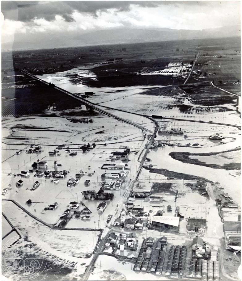 [49] Alviso Flooding 1938 - Located at the mouths of both the Guadalupe River and the Coyote Creek, and now thirteen feet below sea level, no area within Santa Clara Valley has had more experience