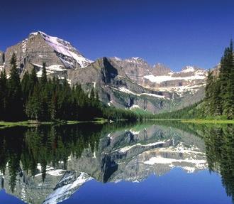 Glacier National Park encompasses over 4,000 square kilometers (1,544 sq mi), and includes parts