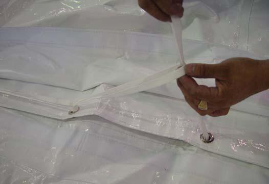 Step 9: Unfold the tent sections on the drop cloth and carefully pull them over the frame. The Festival tops are available in both 1pc Fixed sizes and multiple sectioned expandable sections.