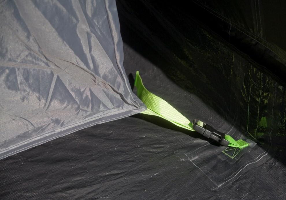Install the vestibule groundsheet by attaching the toggles, on the groundsheet, to the corresponding O rings situated around the inside of the
