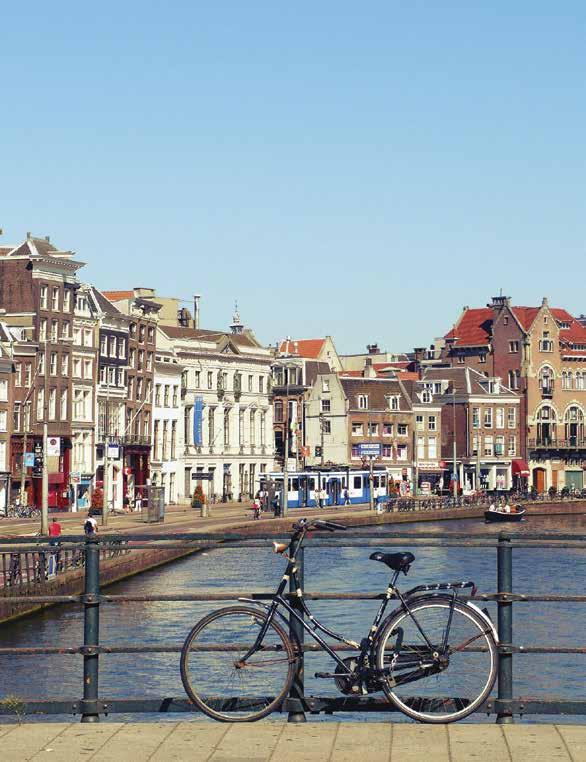 LEISURE TRAVEL: EXPRESS AMSTERDAM, NETHERLANDS* June 15-17 Amsterdam is famous for its windmills, bicycles and narrow streets decorated with gabled houses built by rich merchants along neatly laid