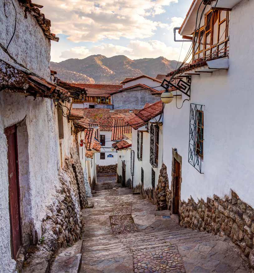 Day 06 Cusco (B/-/-) Walking city tour, including a visit to the district of San Blas, with its winding streets, the whitewashed houses, the blue balconies hung with geranium-filled flowerpots, the