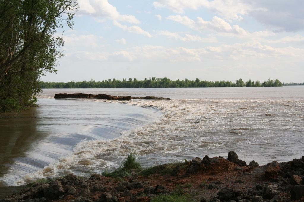 As work crews prepared the floodway for possible pumping operations, water control managers in the Ohio basin reduced releases from Kentucky and Barkley lakes to slow the rate of rise at Cairo.