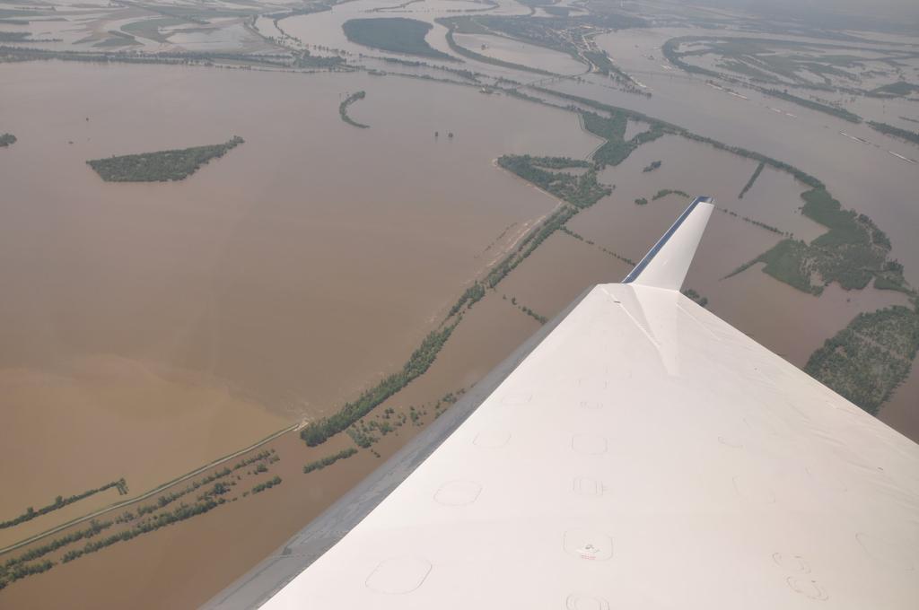 Although the floodway succeeded in significantly reducing stages, the operation did not go according to the operations plan.