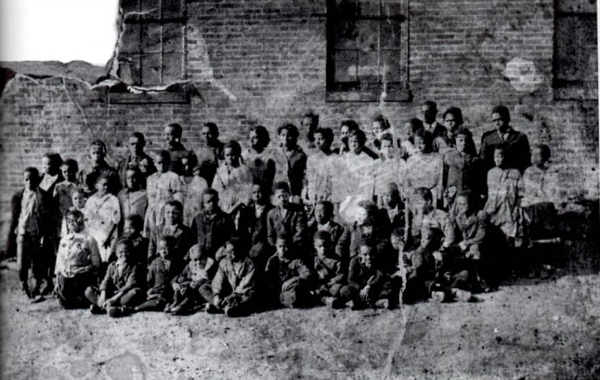 57 Figure 23. African American Children in front of their brick school on J Street in the early 1900s.