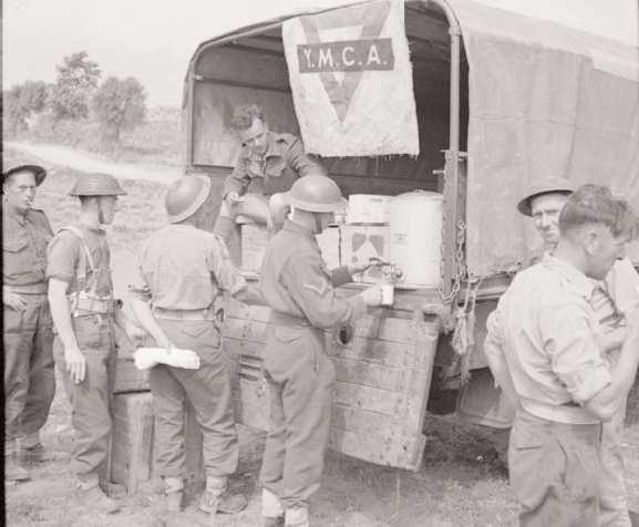 (Jim records on July 9:...When the YMCA van came round, some of us were in a photo taken of it... ) The lads had other consolations too, such as: June 10 1944.