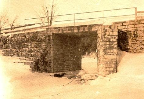 I haven t found the year it was built but records show that it gave way in 1859. Another bridge at the same place was built the same year. This area was and still is called Hog Back.