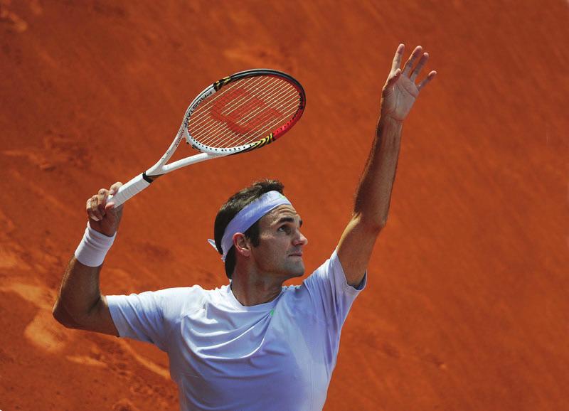 24 LIVE AUCTION LOT NO. 3 Stepping into Roger Federer s shoes and having a ball (or is that a racket.)?