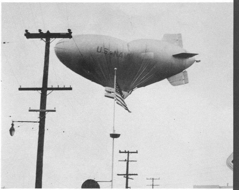 The transfer required careful maneuvering of the airship to enable her to land the cargo on a clear spot on the flight deck. Most of the flight deck space was occupied by B-5s.