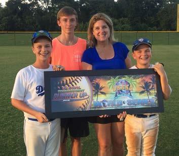 with her sons at the BASEBALL WORLD SERIES in Gulf Shores, Alabama.