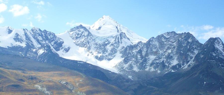 we will be ready to tackle this challenging peak, the tallest in the Cordillera Real. After a beautiful drive through Bolivian farmland and small indigenous towns, we will arrive at our base camp.