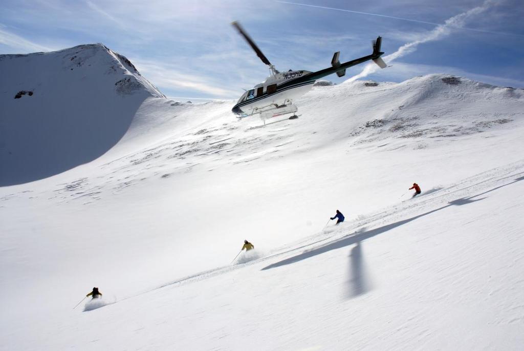HELI-SKIING Taking up to six runs each day, you will ski at 14,000 to 10,000 feet, and fly among some of the the highest elevations in North America.