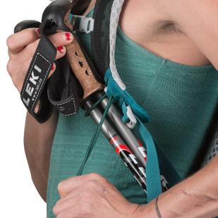 designed to quickly attach and carry trekking poles while wearing a pack.