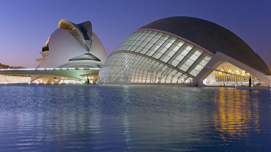 (L'Umbracle) and a parking structure Built between 1998 and 2003, the buildings are surrounded by shallow pools Two streamlined bridges, also designed by Calatrava, cross the promenade between the