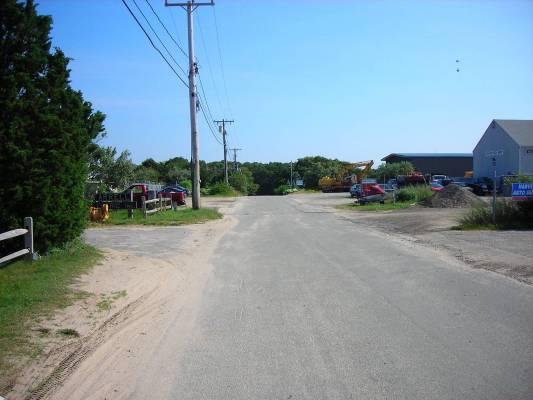 There are a few remaining infill parcels for development. Holmes Road is privately owned and in poor condition. There are currently no streetscape enhancements or sidewalks.