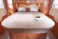 can be separated from the living area 2 wardrobes beside queen-size bed, pull-out systems on front side of queens